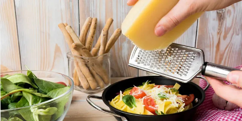 How to Heat, Carve, and Use a Cheese Wheel for Pasta Like a Pro